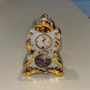 Elegant Gold and White Porcelain Clock